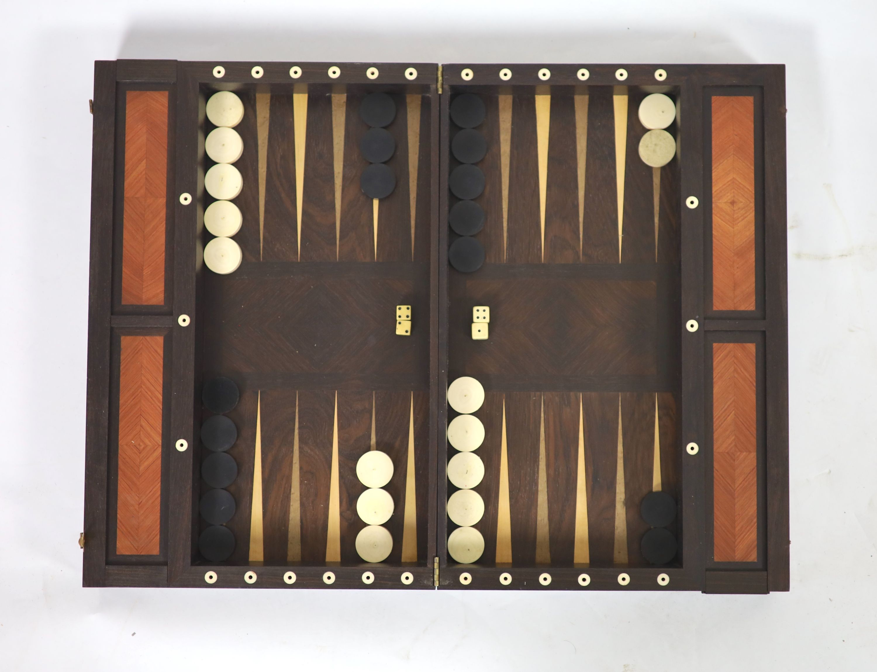 An early 20th century rosewood folding games board, external chess and internal backgammon, W 75cm D 56cm when open, W 75cm D 37cm when closed